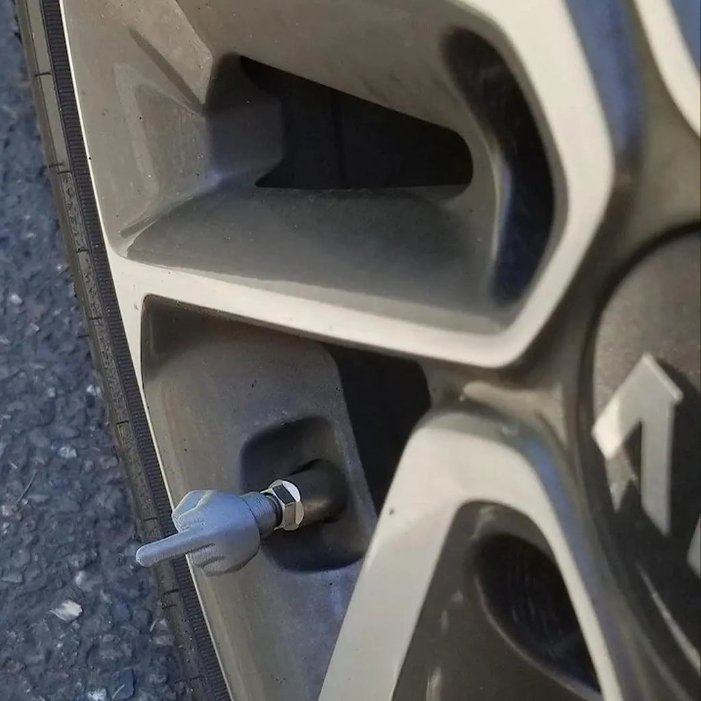 Eight latex tyre valve caps showing four black and four skin-coloured pieces for car tyre protection