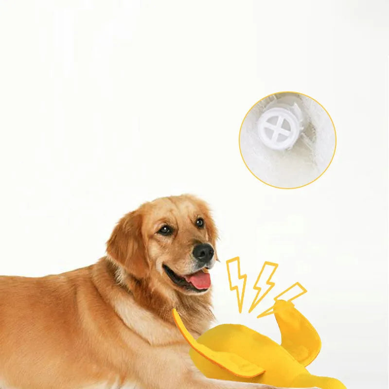 Yellow teddy fabric duck-shaped dog toy with squeaker and hidden food compartment
