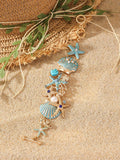 Women's alloy bracelet with starfish and boat anchor rhinestones in turquoise, red, or blue.