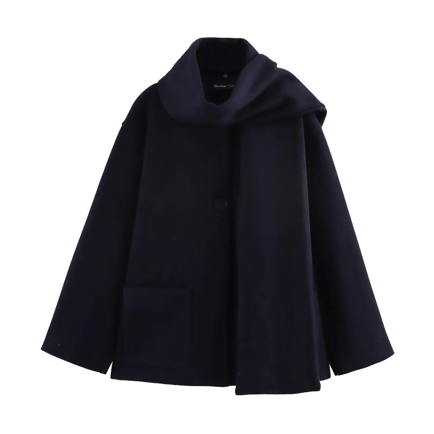 Women's long black overcoat with an artificial fur collar, shown with side pockets.