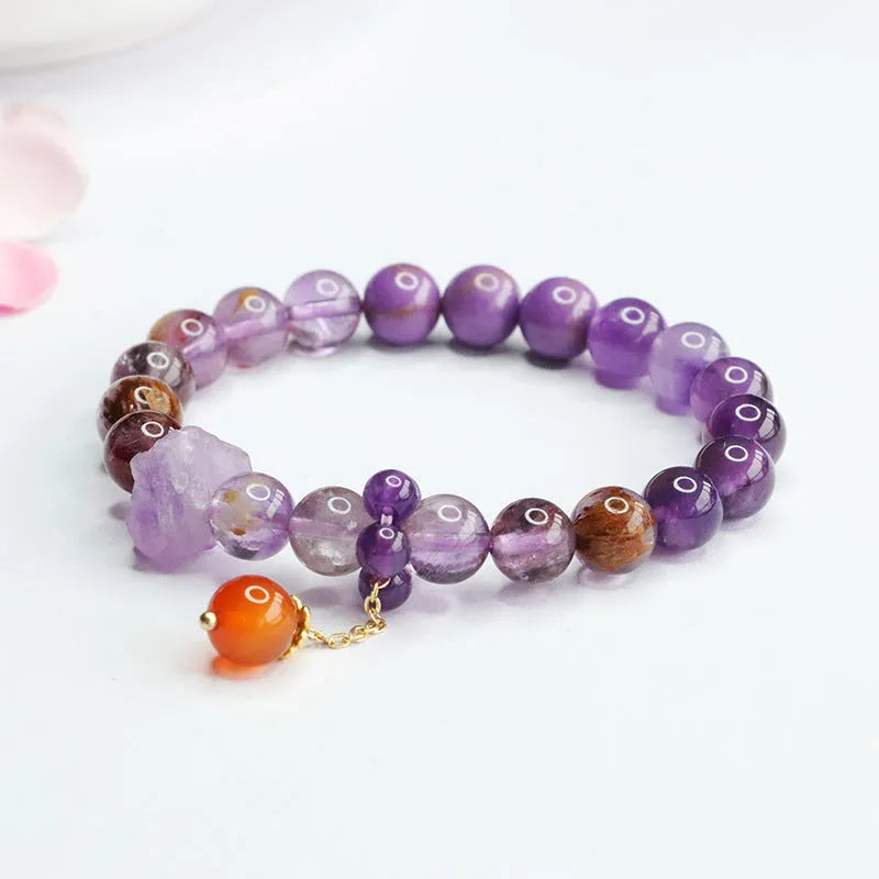 Nine purple natural amethyst crystal bracelet with red agate accents in Mori style