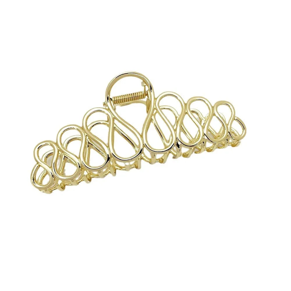 Large minimalist updo hair clip with tassel detail in gold or silver electroplated finish