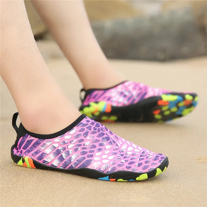 A pair of quick-dry beach wading shoes in camouflage print, showing the Lycra elastic upper and EVA midsole.
