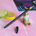 Scratch art painting kit with tools, healing pen, photo frames, and gift bag on a white card surface.