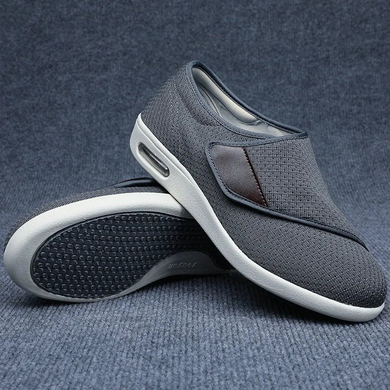 Beige leisure shoes with velcro strap closure and a round toe on a foam rubber sole.