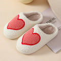Adult women's plush cartoon pattern slippers with round toe and non-slip PVC sole
