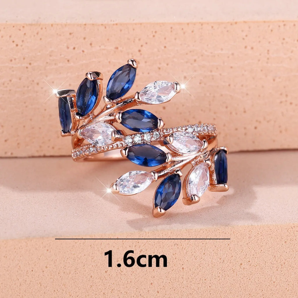 Adjustable copper leaf ring with a central horse eye zircon stone in a choice of nine colour finishes.