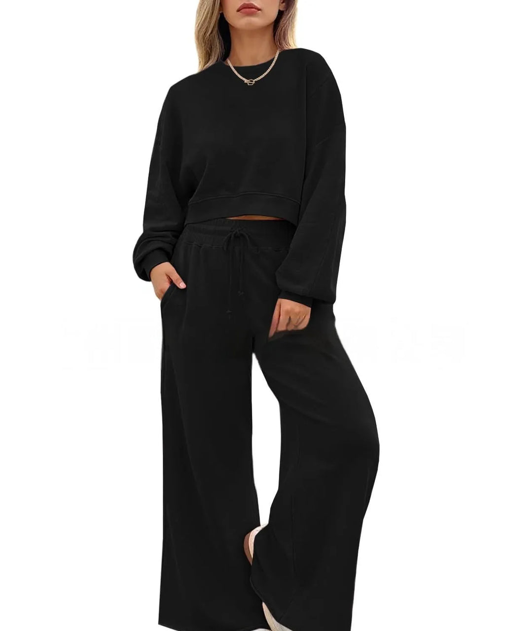 Women's solid colour polyester trouser set with long sleeve top, shown in apricot colour.