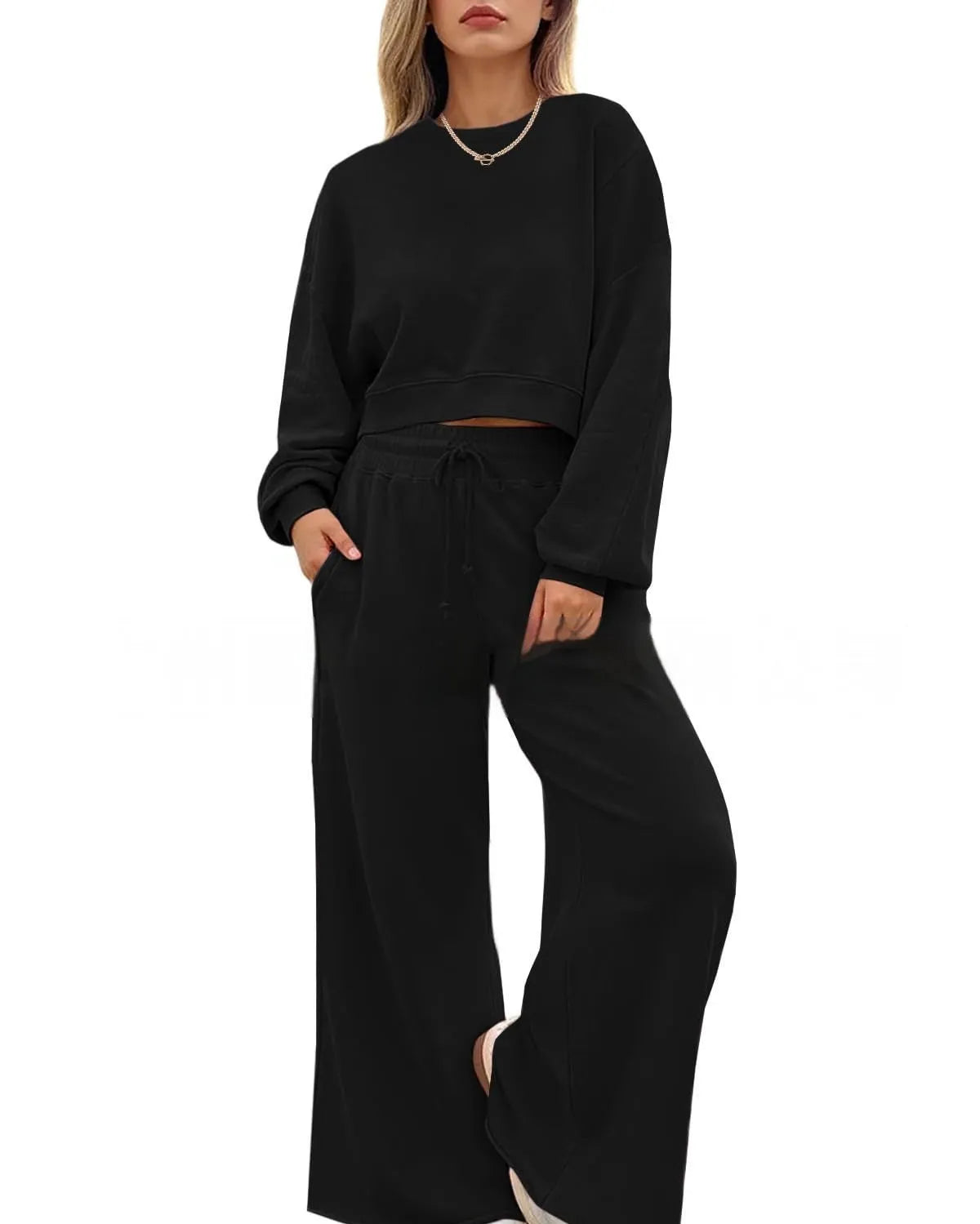 Women's solid colour polyester trouser set with long sleeve top, shown in apricot colour.