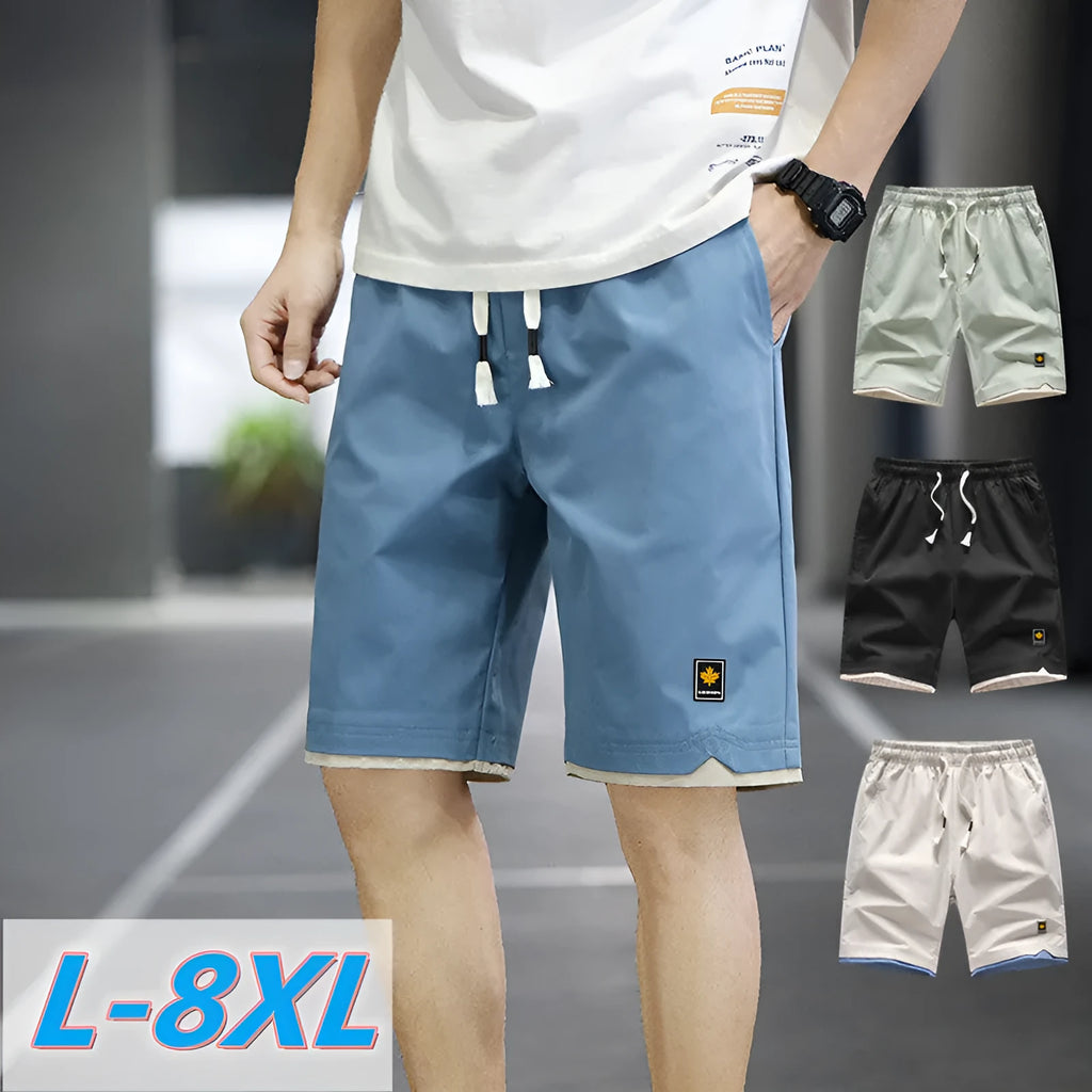 Men's loose-fitting Korean-style casual shorts in khaki, shown on a model.
