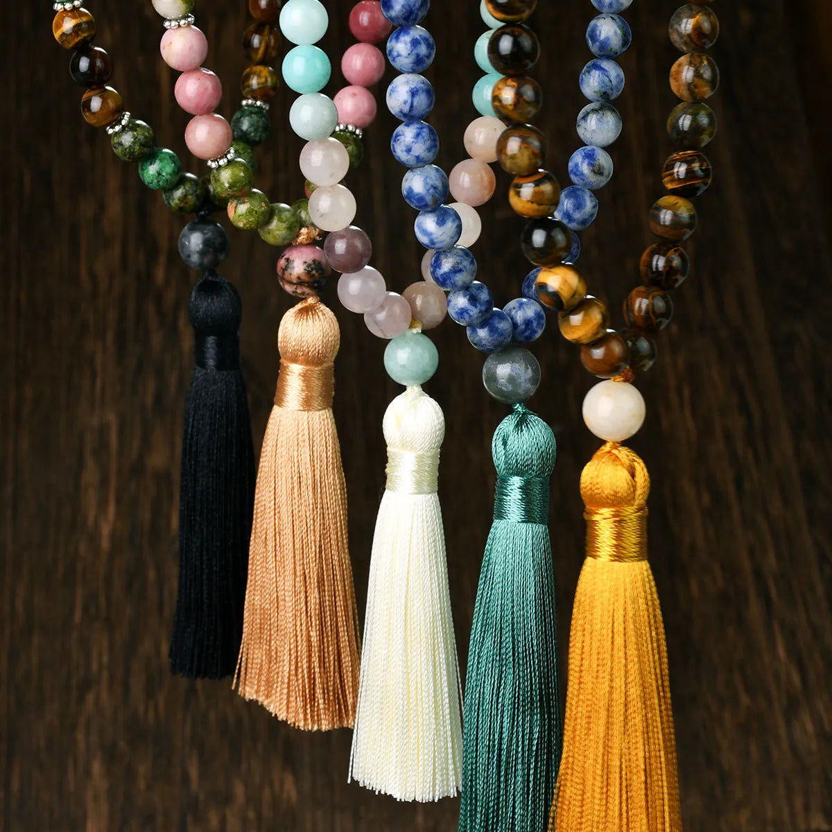 Long 108 natural stone bead necklace with mixed gemstone tassel pendant in bohemian style.