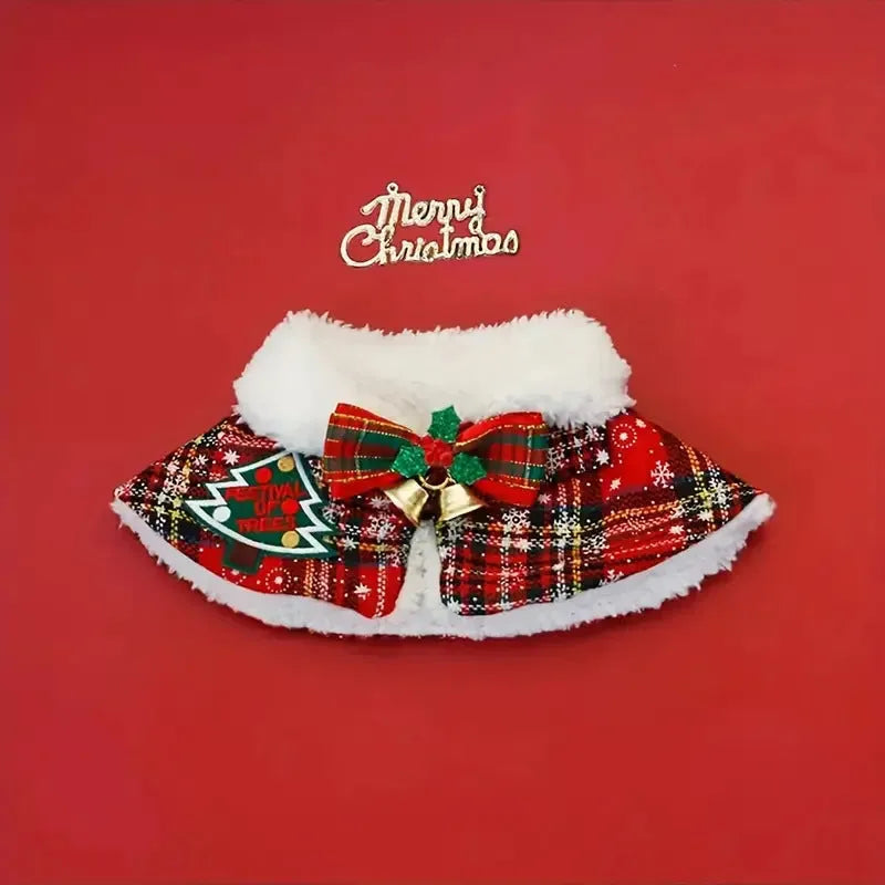 Red polyester pet scarf with snowflake bell design tied around a dog's neck for Christmas