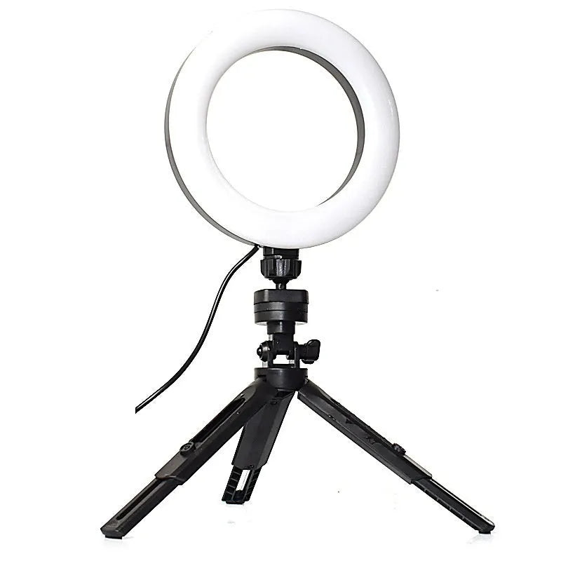 Black universal mobile phone bracket with adjustable fill light on a desktop tripod for live streaming.