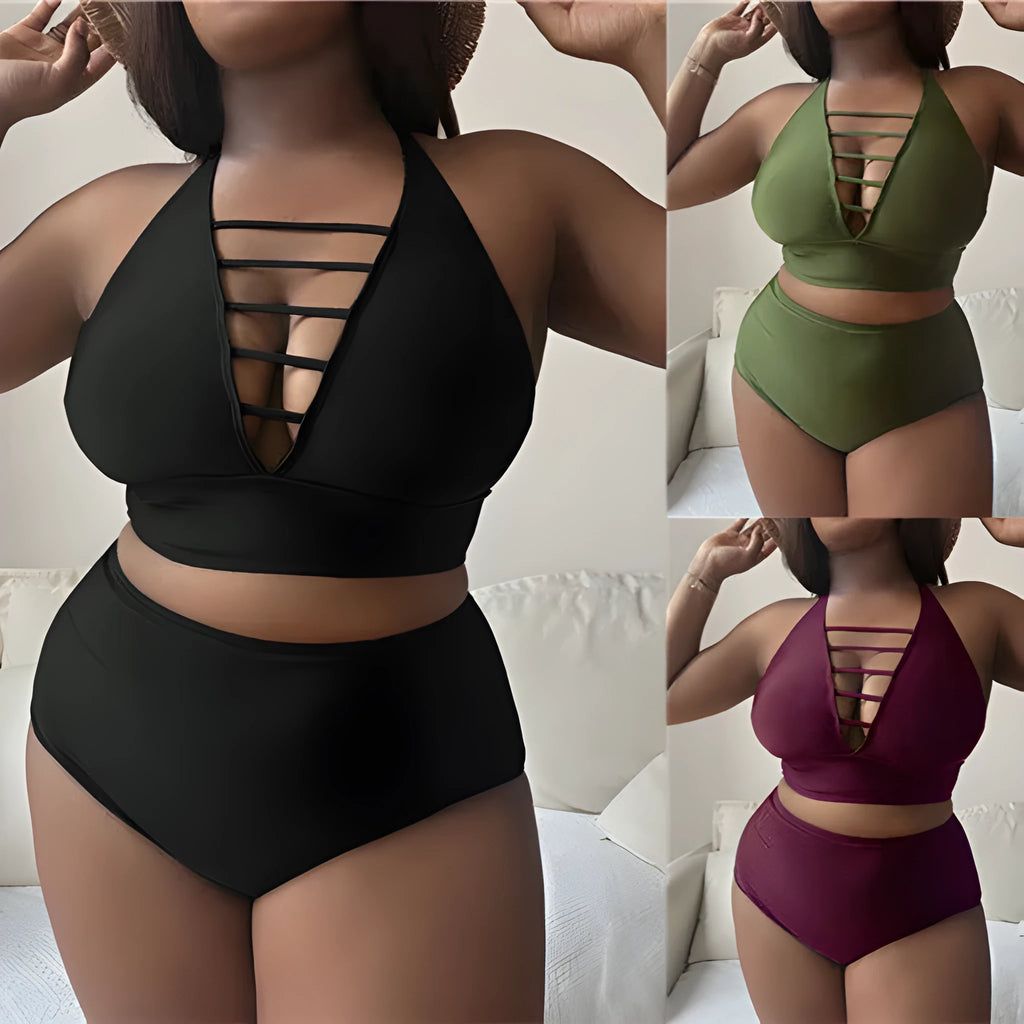 Plus size woman modelling a black halter neck bikini with cross-back straps and high-waisted briefs.