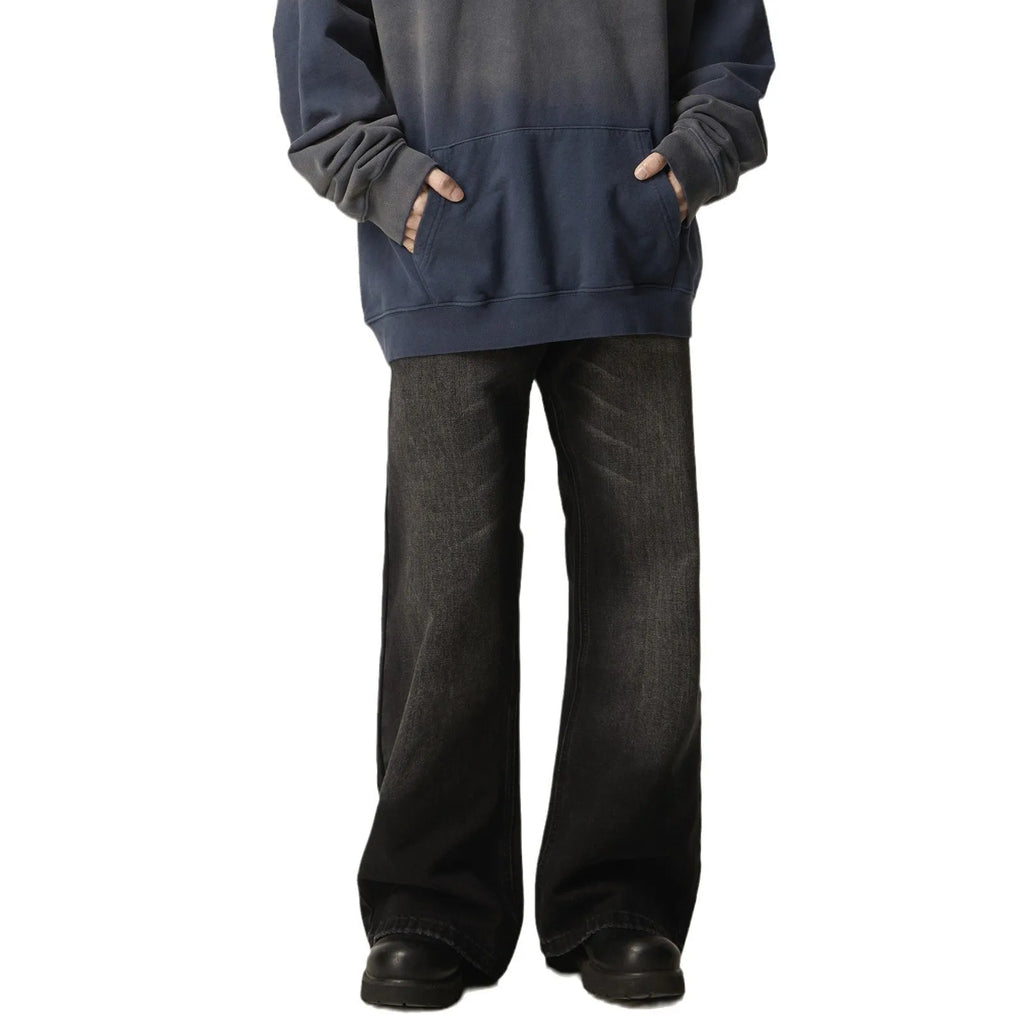 Black loose straight-leg retro jeans with zip fly opening on mannequin