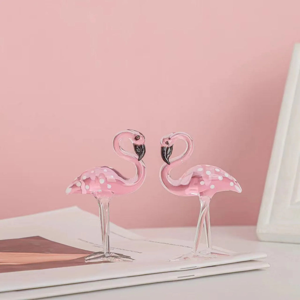 Pink crystal flamingo decorative ornament on table with modern minimalist style