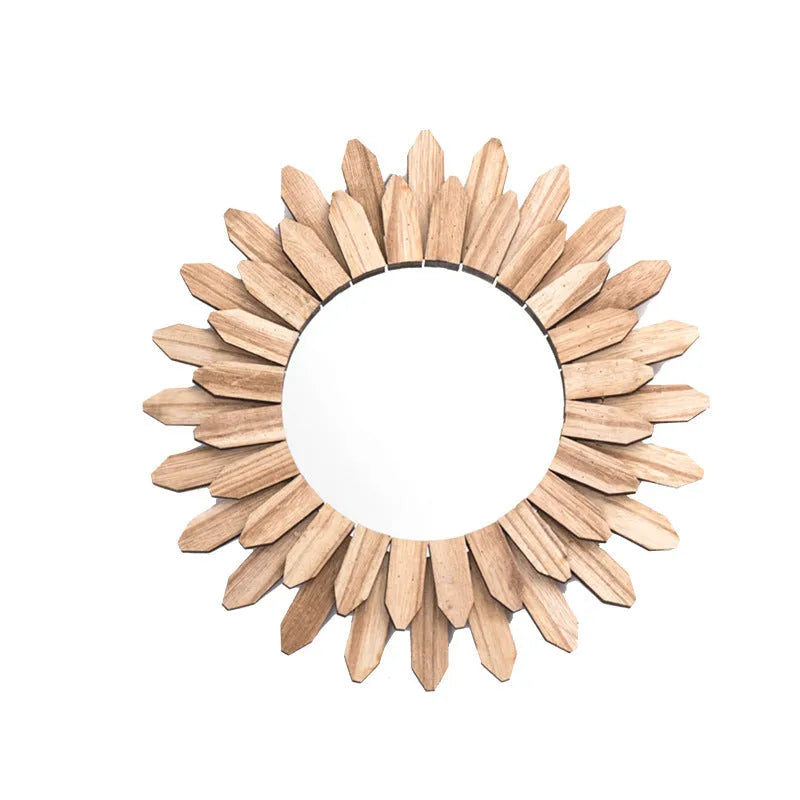 Circular wooden hanging mirror with a baked colour finish on a plain wall.