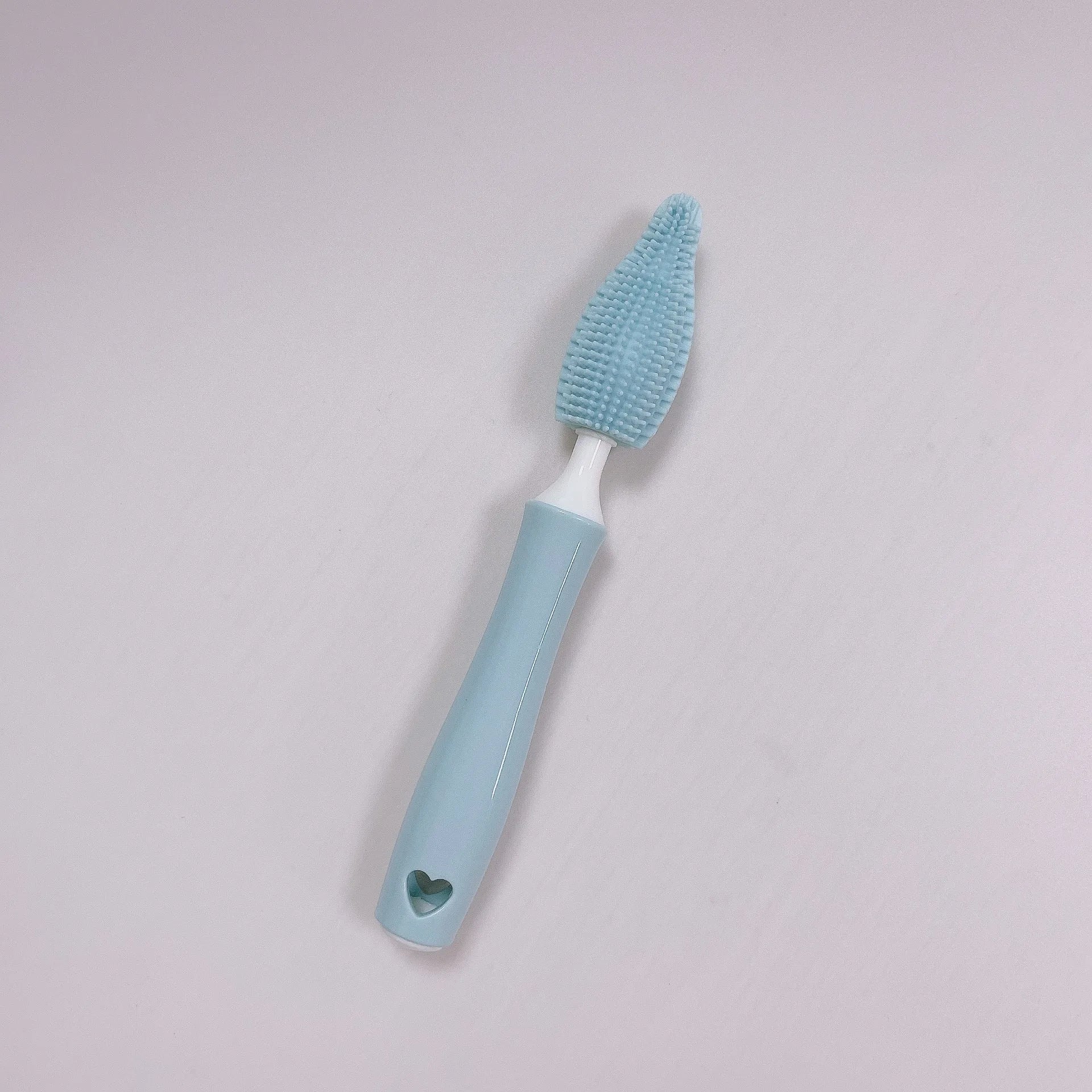 Silicone baby bottle brush set with straw cleaning brush in pink, blue, and yellow