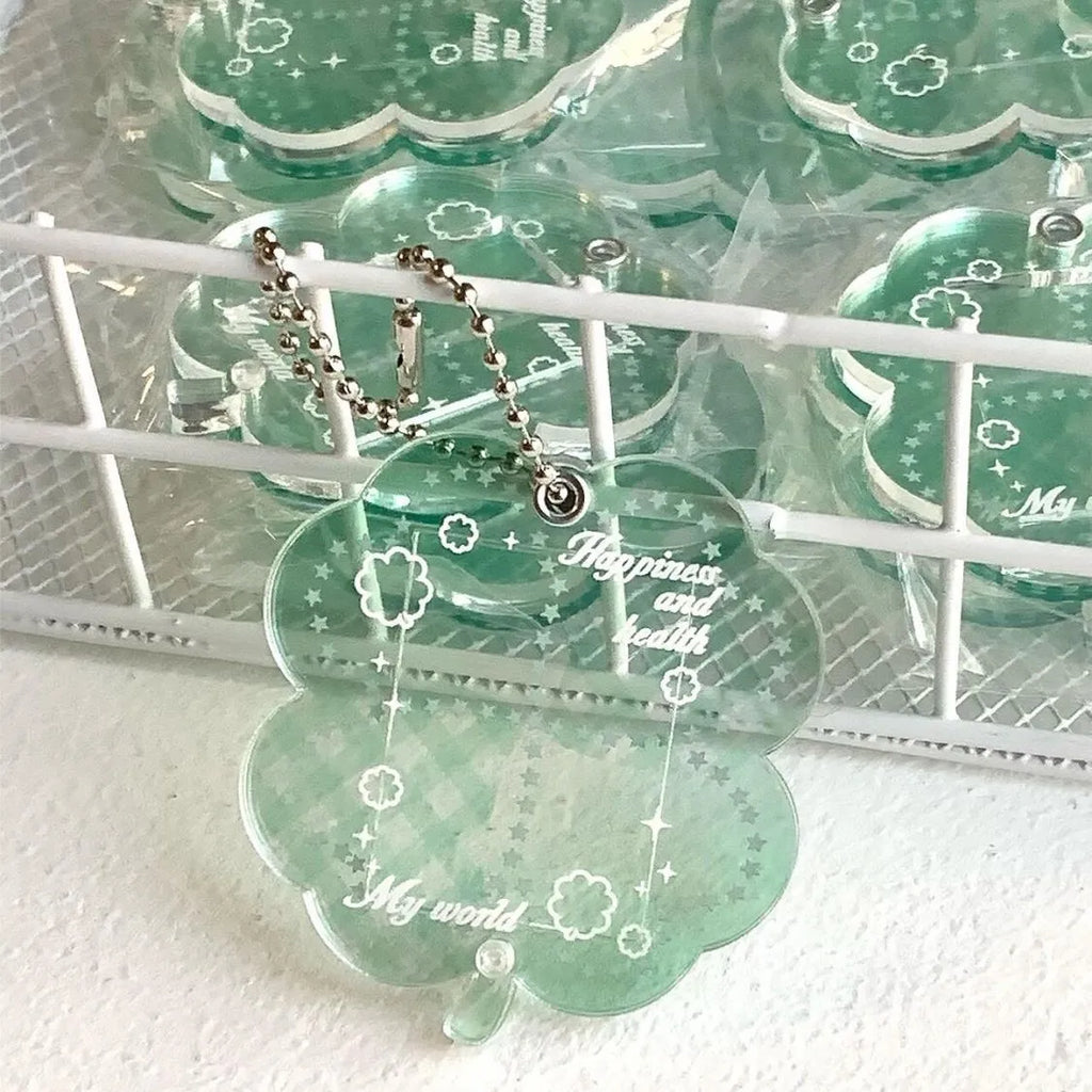 Acrylic four-leaf clover phone pendant keychain in blue, green, or mint