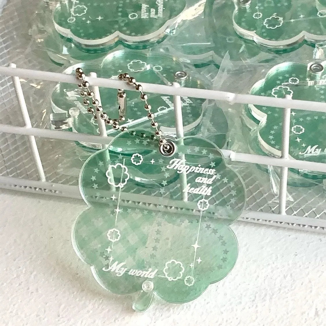 Acrylic four-leaf clover phone pendant keychain in blue, green, or mint