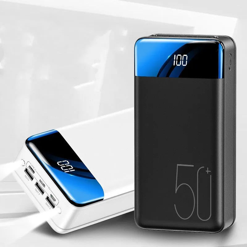 Large 50000mAh capacity power bank with three USB charging ports in black plastic case