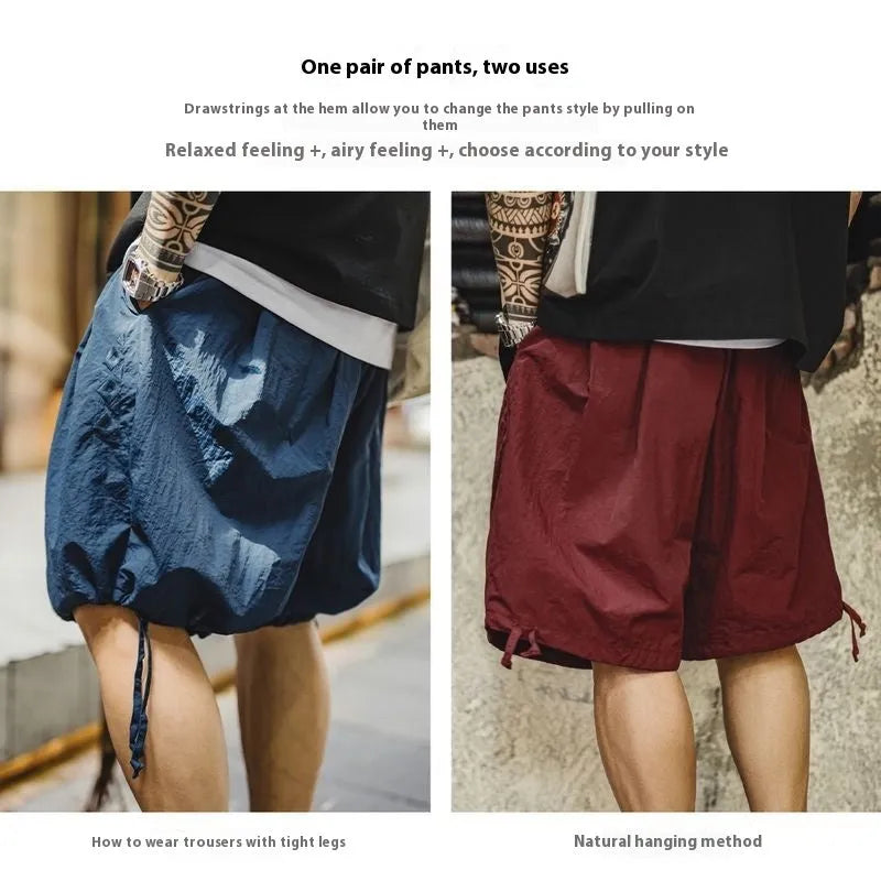 Men's Prussian Blue nylon beach shorts with embroidery and loose fit design