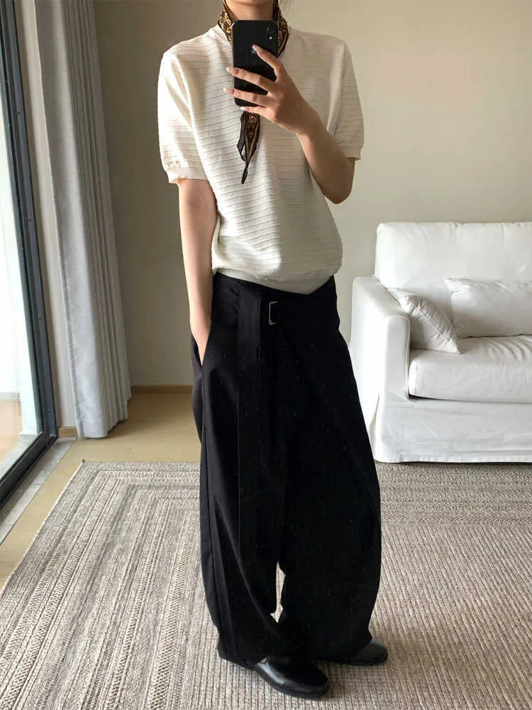 Black straight-leg trousers with adjustable waist and single pleat design in Tencel cotton blend fabric