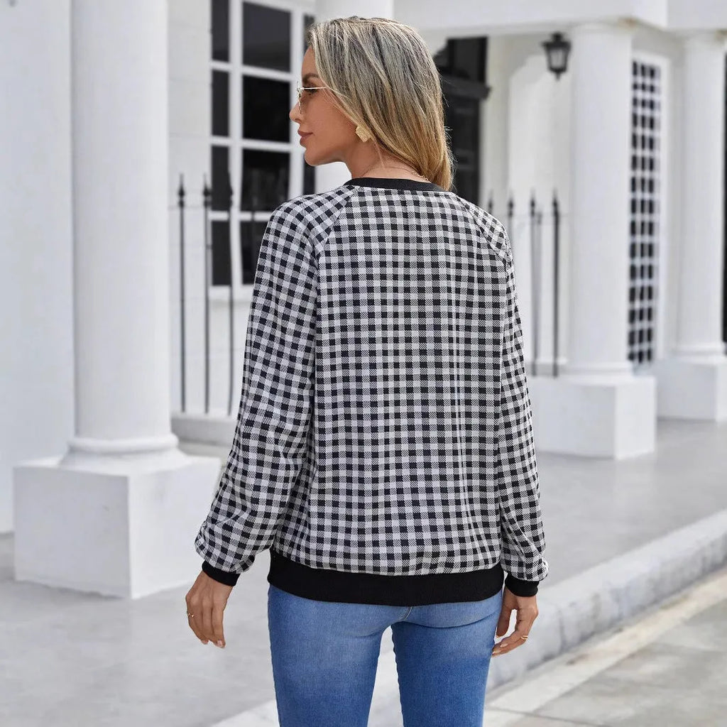 Black Japanese plaid pattern pullover sweater with printed design and long sleeves