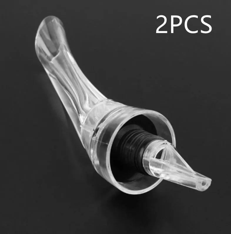 Acrylic wine aerator with stainless steel filter, measuring 16cm by 4.2cm.