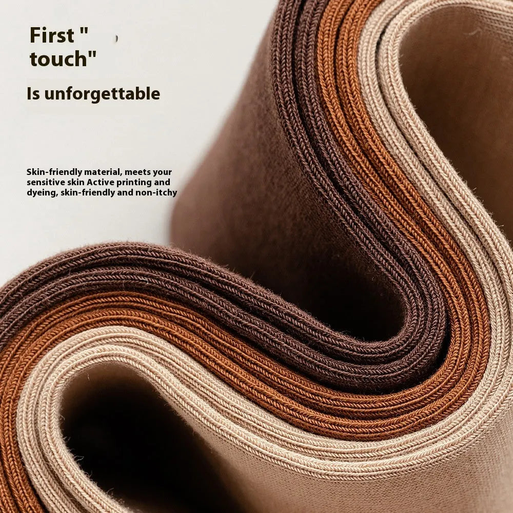 A pair of men's solid colour mid-calf socks made from combed cotton for business wear.