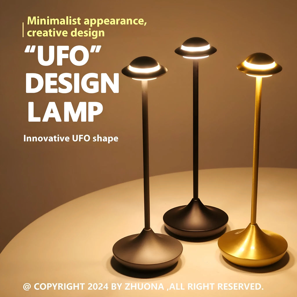 Metallic UFO-shaped desk lamp with touch dimming in black, gold, or grey colour options