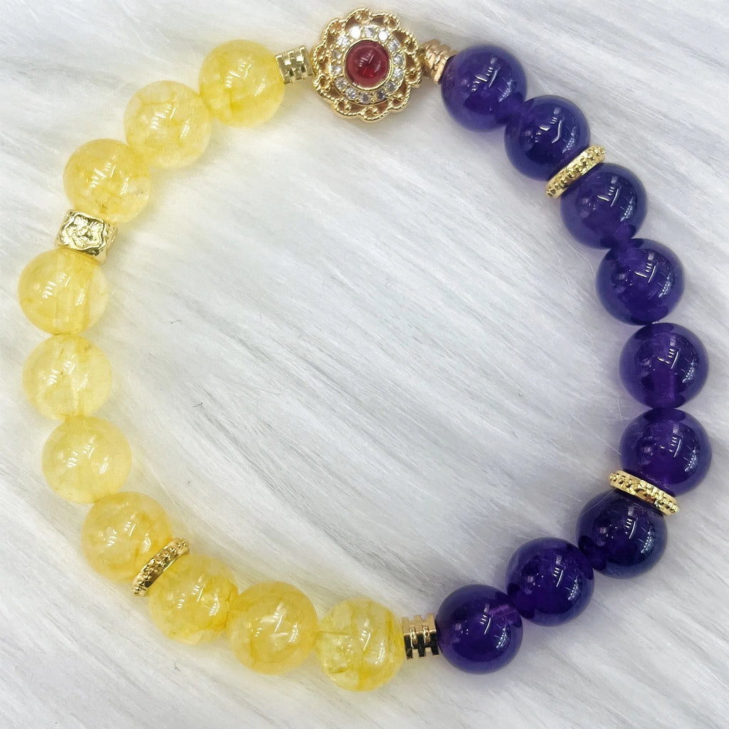 Handmade women's bracelet with yellow and purple crystal amethyst stones on adjustable clasp