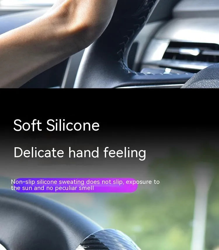 Black and blue silicone steering wheel assist ball showing 9cm by 6cm dimensions
