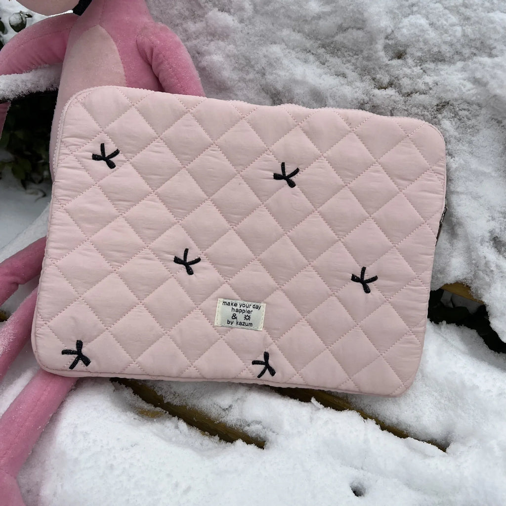 White laptop storage bag with rhombus embroidery and bow design in nylon fabric