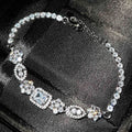Women's geometric zircon bracelet with silver and white gold plating.