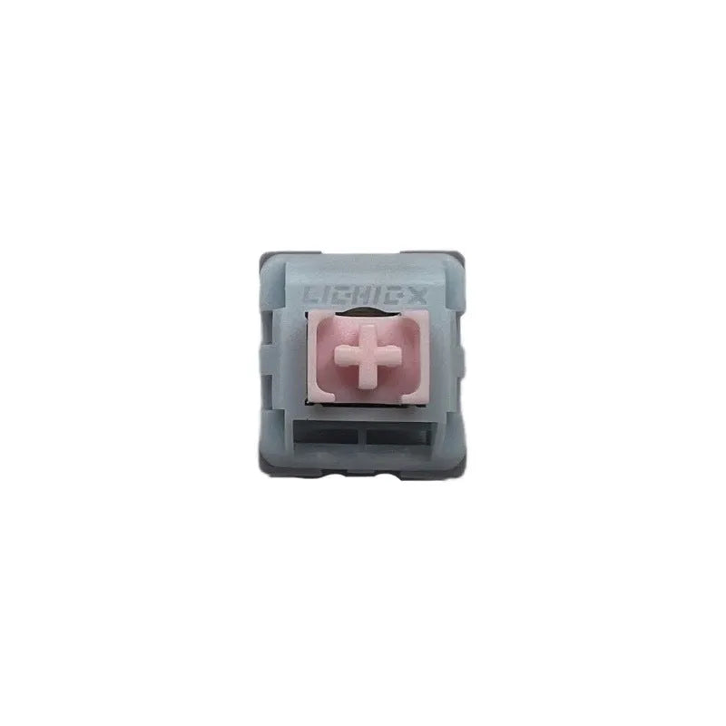 Four mechanical keyboard switches with small window design and dew axis colouration showing internal components