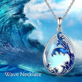Moonstone blue alloy heart pendant necklace with chain on white background