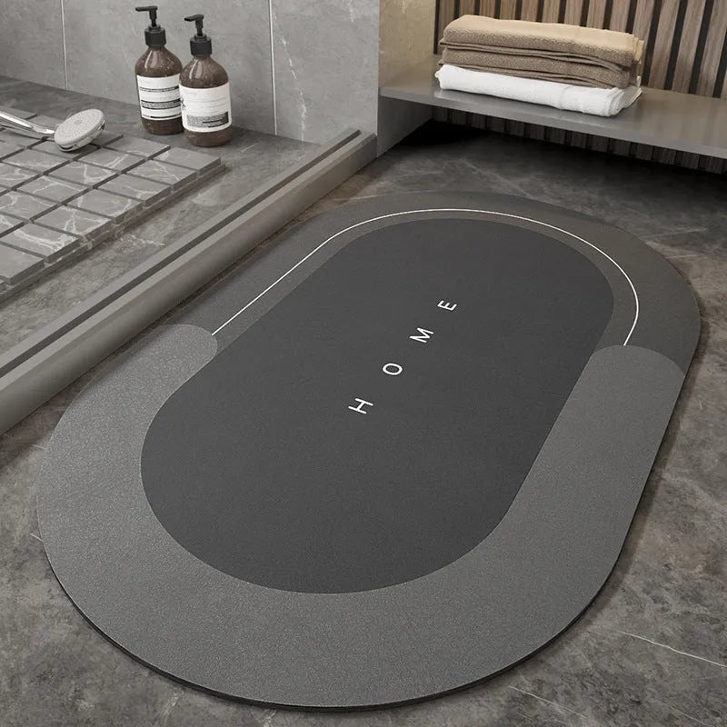Bathroom floor mat in blue colour, oval shape, showing machine-woven blended texture