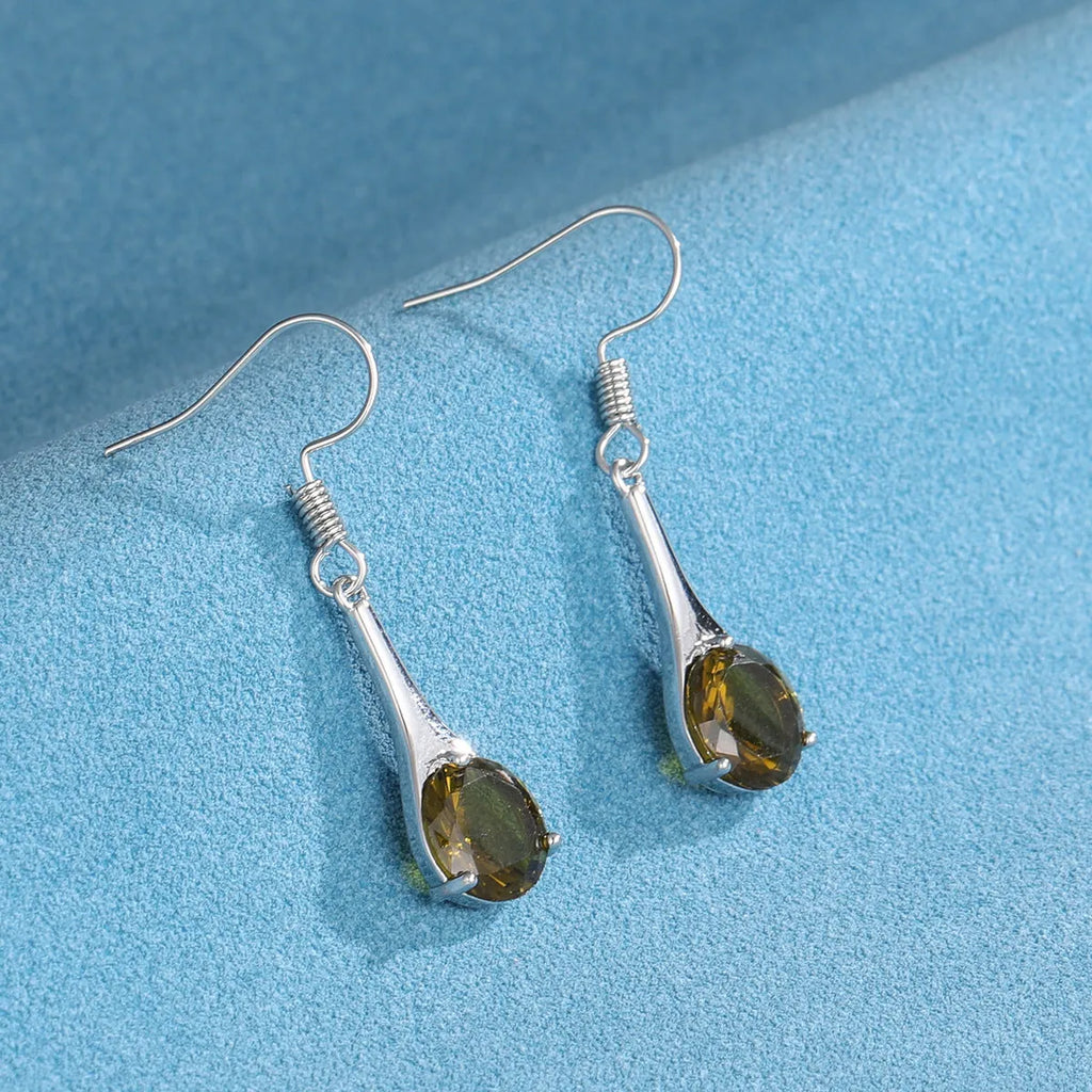 Olive green topaz water drop shaped earrings with electroplated finish and retro styling