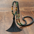 Long 108 natural stone bead necklace with mixed gemstone tassel pendant in bohemian style.