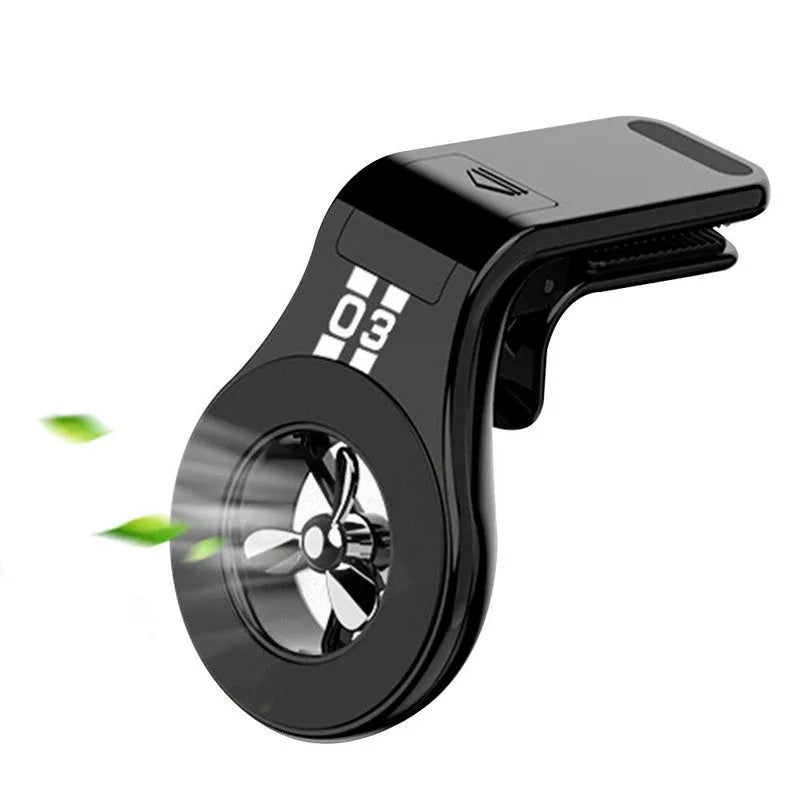 Black magnetic car air vent phone holder with adjustable mount and fragrance slice compartment.