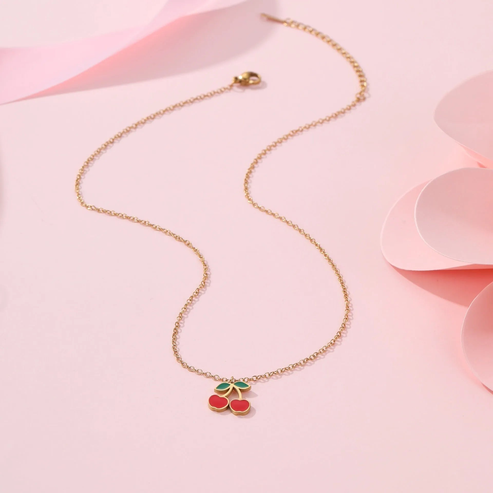 Four-piece 18K gold plated stainless steel jewellery set featuring cherry shaped necklace bracelet earrings and ring