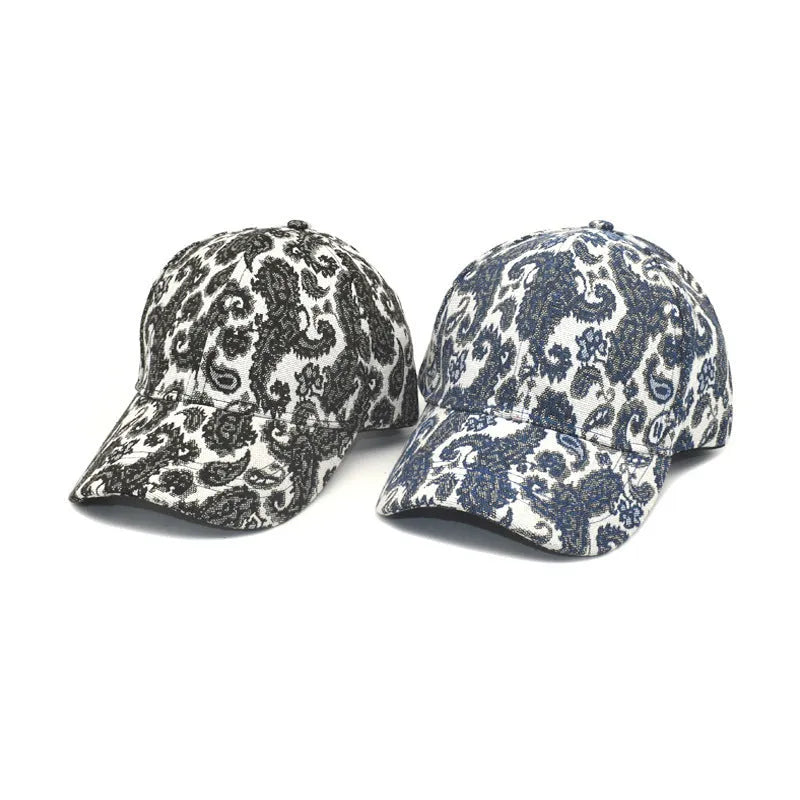 Polyester baseball cap with paisley print pattern in blue, black, or wine red.