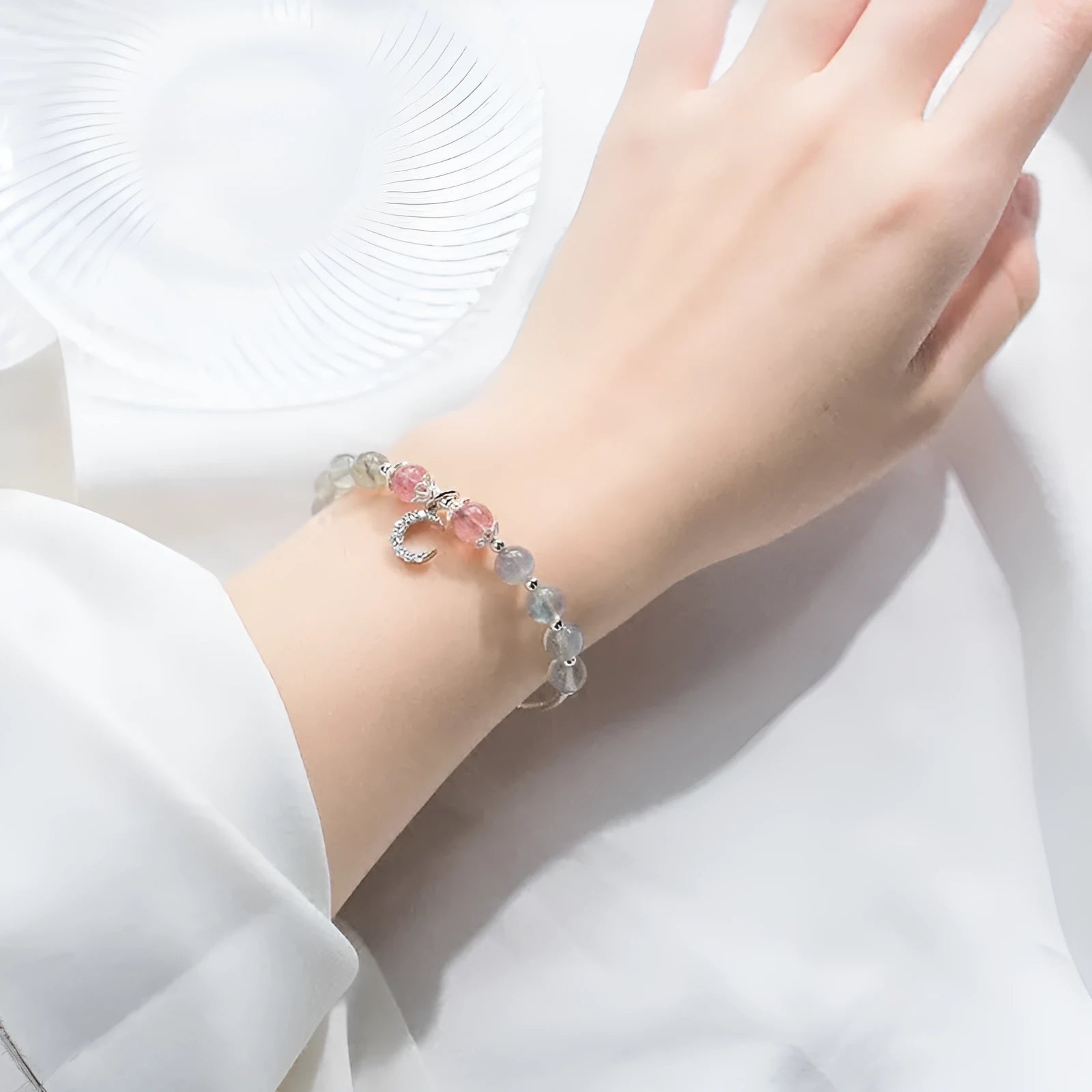 Moonstone bracelet with crescent moon charm on adjustable extension chain