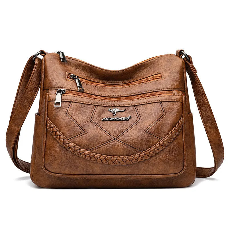 Soft leather women's shoulder bag in horizontal square design with crossbody strap