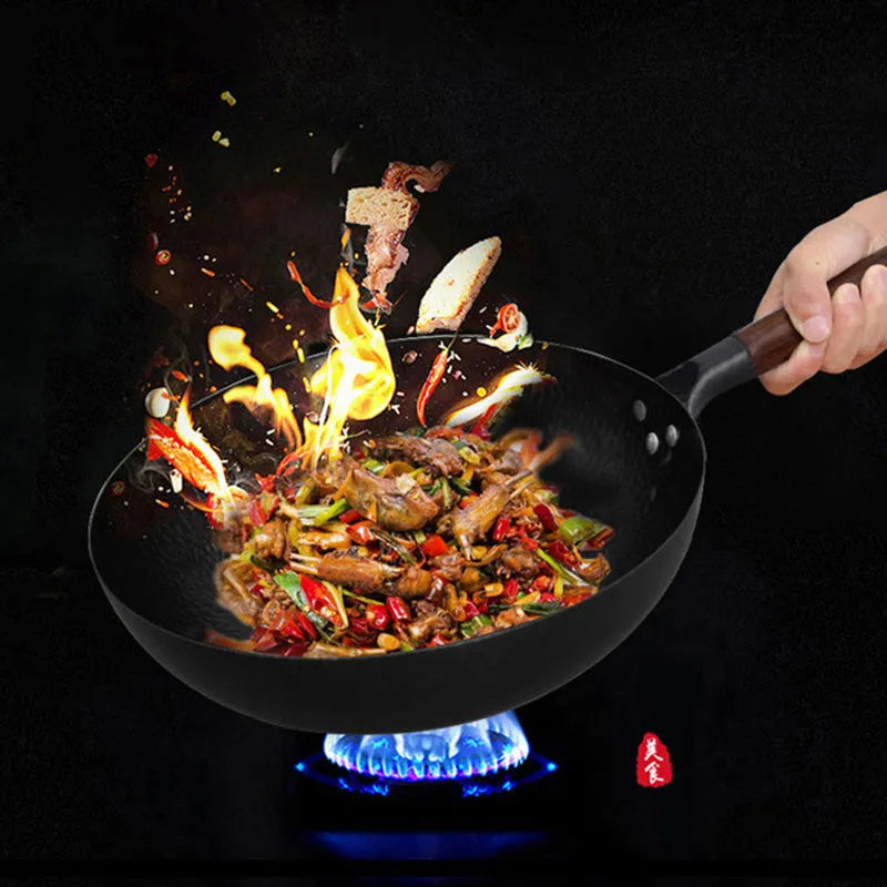 Black handmade traditional iron wok with wooden handle, 32cm diameter with lid.