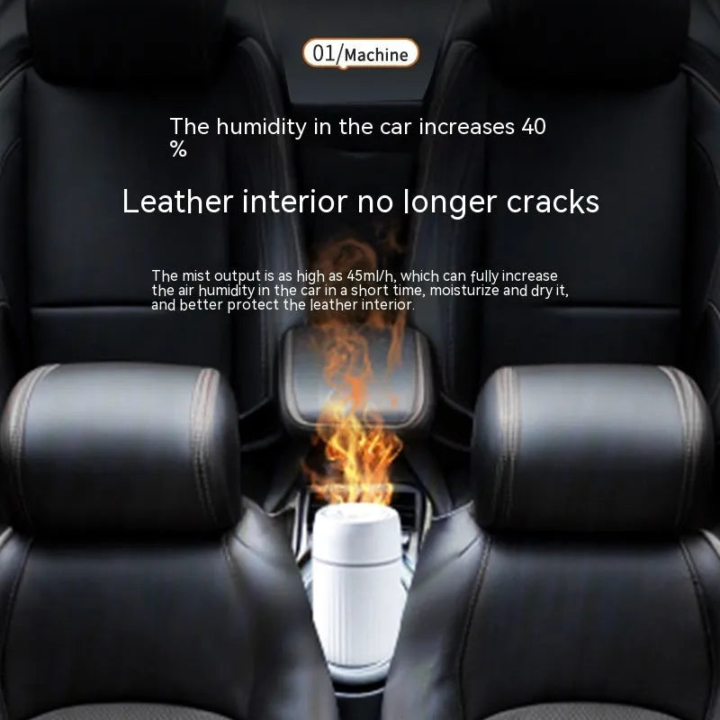Black car aroma diffuser with flame simulation effect showing automatic sprayer functionality