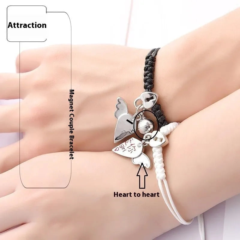 A pair of matching magnetic suction bracelets with an alloy electroplated finish, showing a sample design.