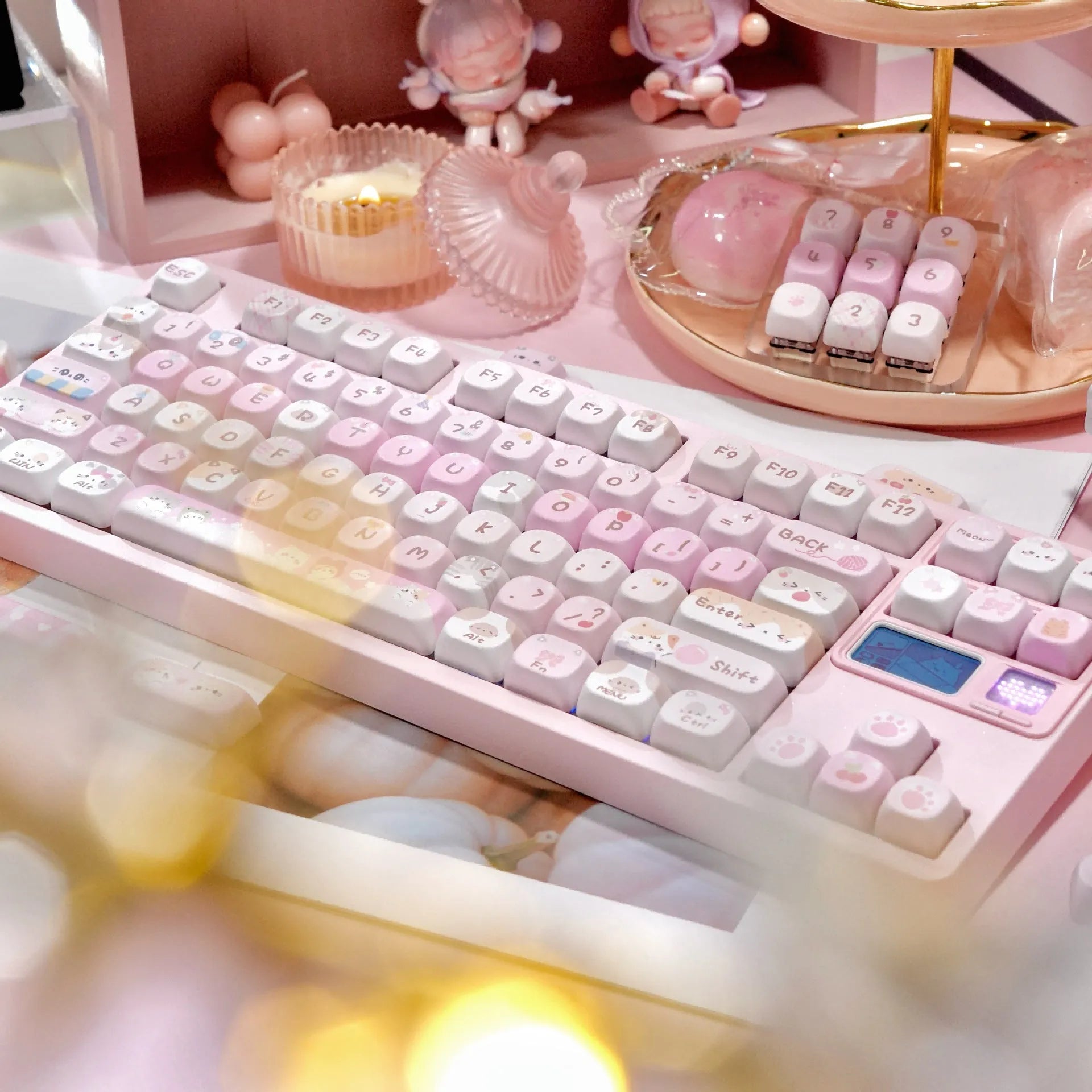 MOA height pink sublimation keyboard keycap set with cartoon design, shown on a keyboard.