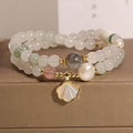 Crystal bracelet with gold-plated artificial gemstone inlay and Tianshan Jade shell ginkgo leaf pendant